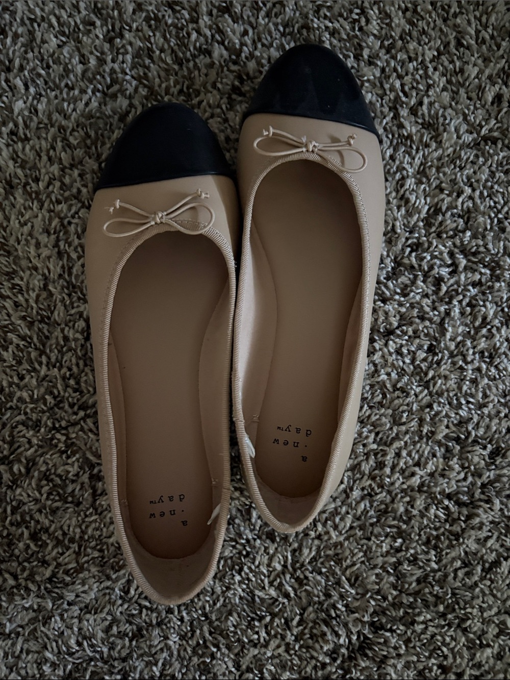 a new day Beige Flats with Black Cap Toe and Bow